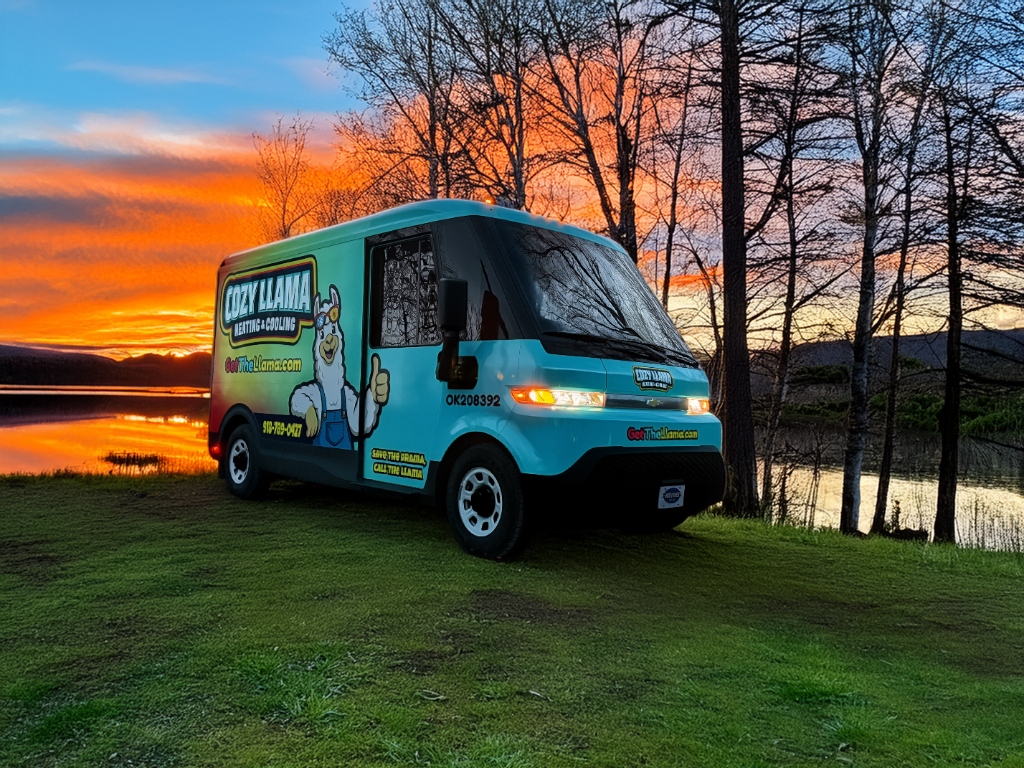 Cozy Llama Service Van at Sunset